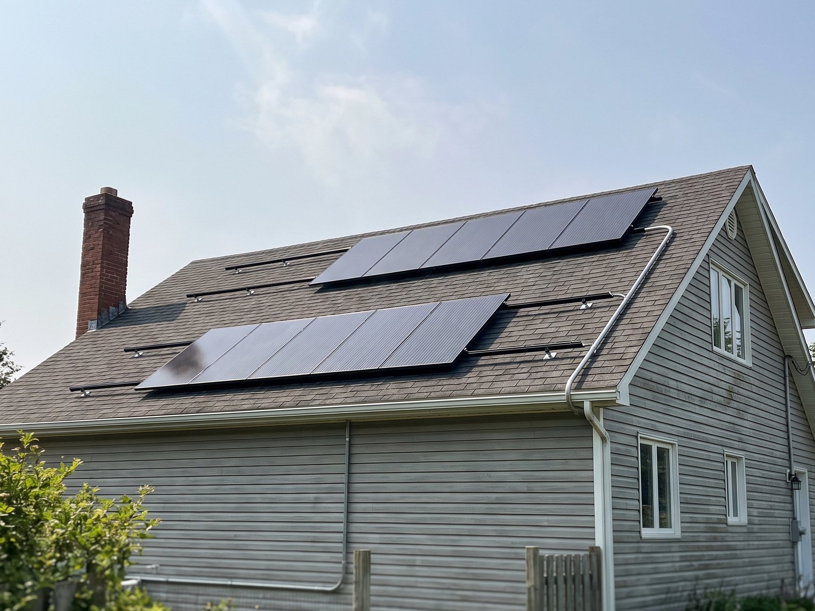 A residential solar panel array on the south facing roof of a Southern New Brunswick home, photographed during a home inspection