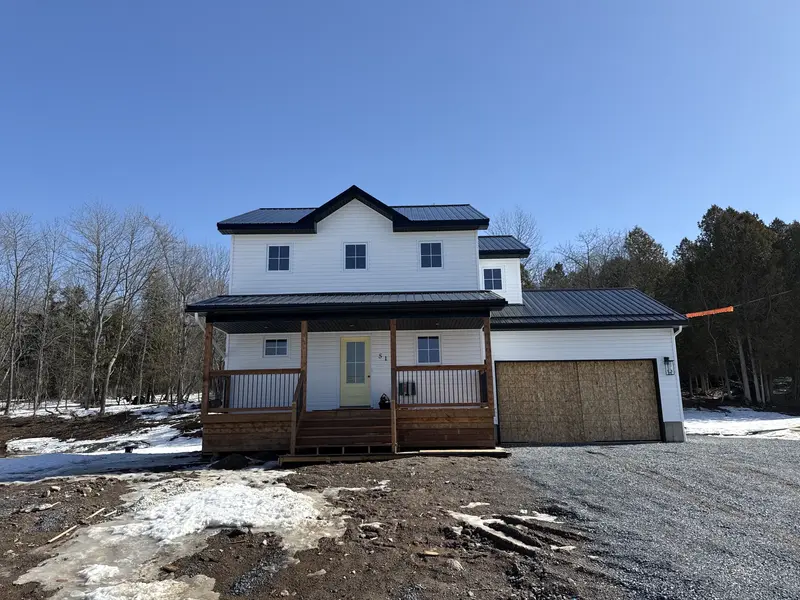 New construction home inspection in winter, Quispamsis New Brunswick, two-storey residential exterior