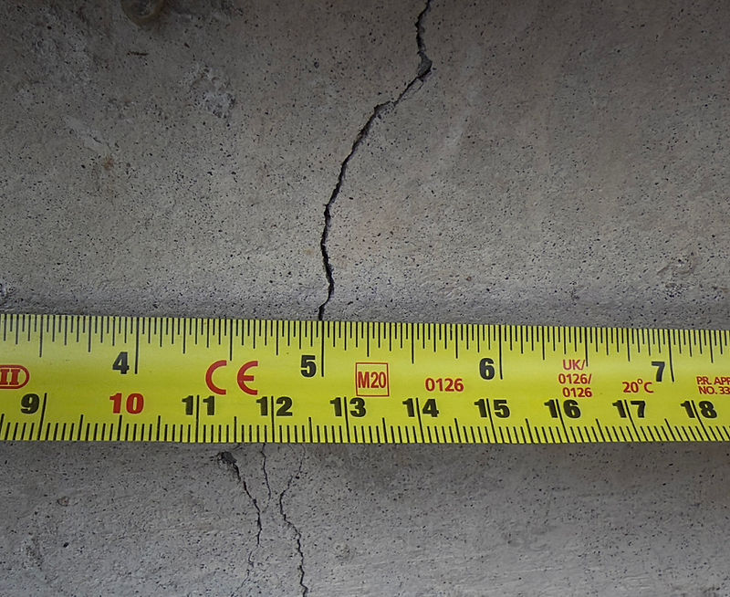 Vertical foundation crack in a pre-1980 Saint John home basement wall worsened by freeze-thaw cycles during the 2025-2026 winter