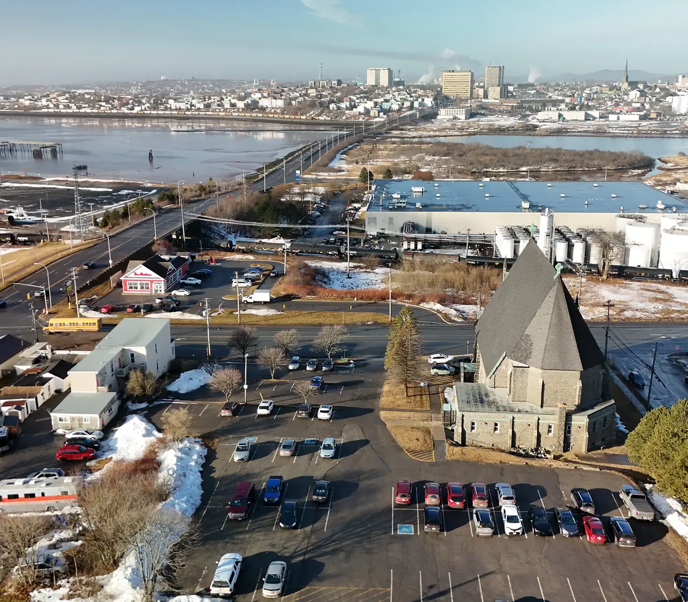 Aerial drone view of Saint John, New Brunswick, with the downtown skyline and harbour in winter